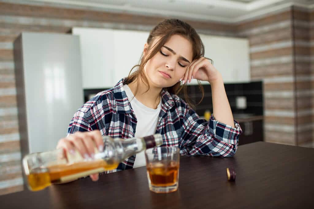 woman shows signs of alcoholism