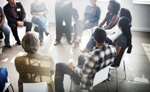 A group of people attend the substance abuse support groups Portland Maine offers including dual diagnosis support groups and addiction support groups