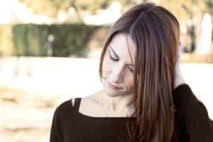 a woman thinks about how she needs the bipolar disorder treatment Portland Maine offers