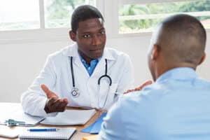 therapist helps a man understand codependency at a codependency treatment center in portland maine